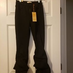 Black stylish jeans with scrunging at the bottom